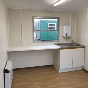 Wired open plan interior with power points and strip lighting for sale in Australia.